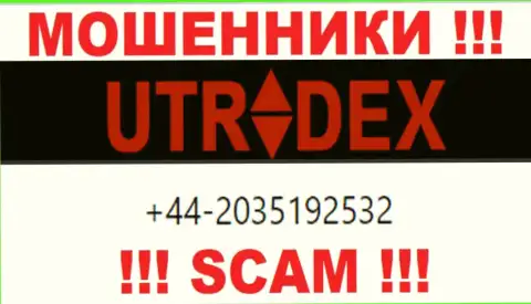 У UTradex далеко не один номер телефона, с какого будут трезвонить неизвестно, будьте весьма внимательны
